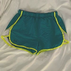 Women’s Under Armour blue & yellow athletic shorts with drawstring intact